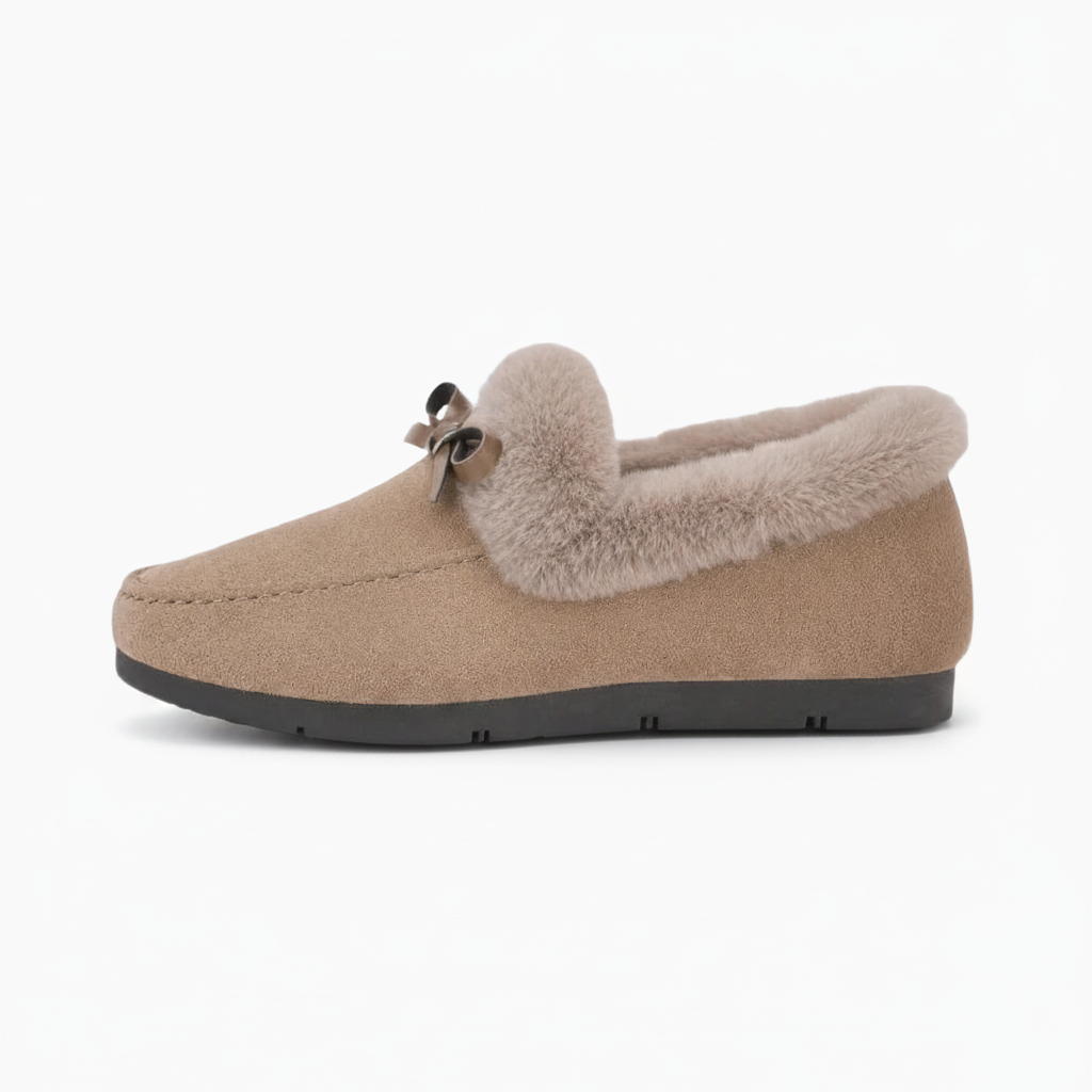 Vue détaillée de la doublure polaire beige à l'intérieur du chausson, promettant douceur et chaleur.
