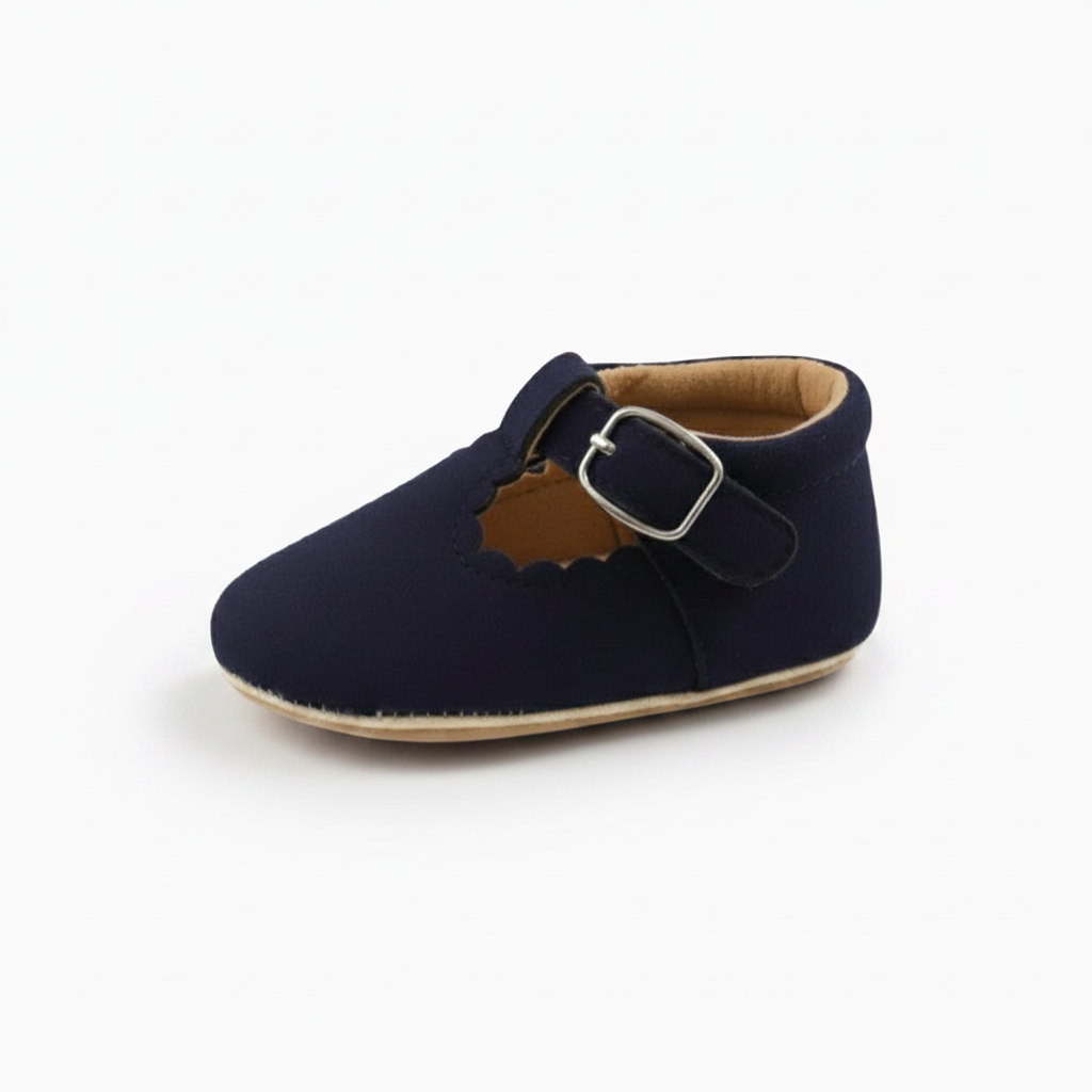 Semelle antidérapante du mocassin bébé bleu marine, conçue pour la sécurité et la stabilité des enfants.