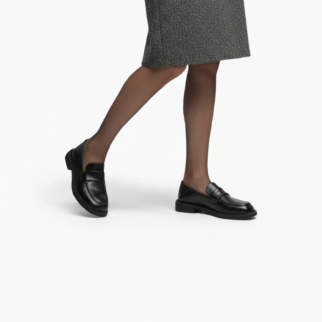 Semelle antidérapante du mocassin en cuir vernis, conçue pour une adhérence optimale et durable.