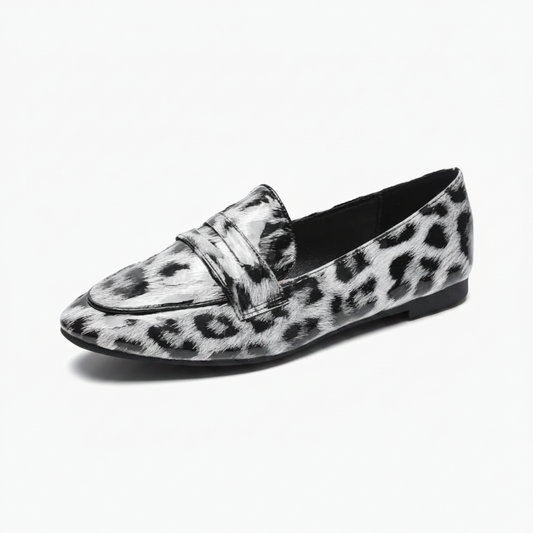 Mocassins femme léopard blanc et noir, motif audacieux pour un style unique.