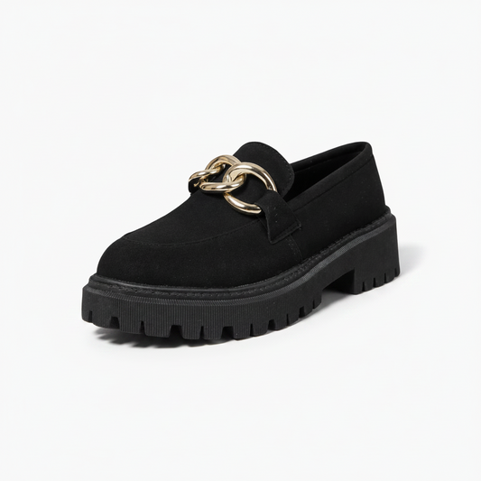 Mocassins femme noirs et dorés, alliance élégante de couleurs classiques et d'un éclat subtil.