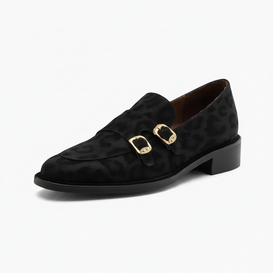 Mocassin femme noir en cuir, élégant avec son imprimé léopard audacieux, offrant un style sophistiqué et intemporel.