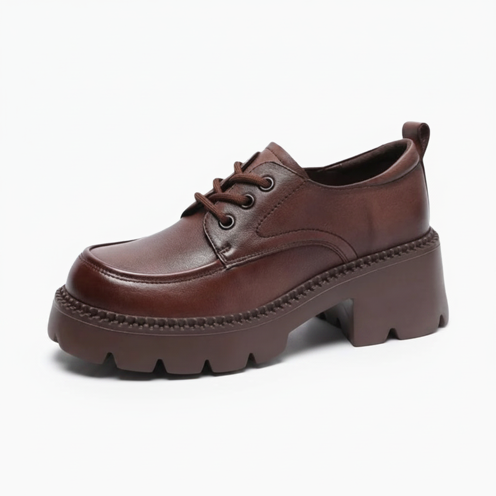 Mocassin plateforme marron en cuir de haute qualité, offrant un confort affirmé et une allure chic pour femme.