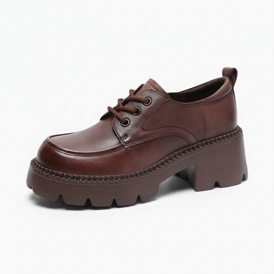 Mocassin plateforme marron en cuir de haute qualité, offrant un confort affirmé et une allure chic pour femme.